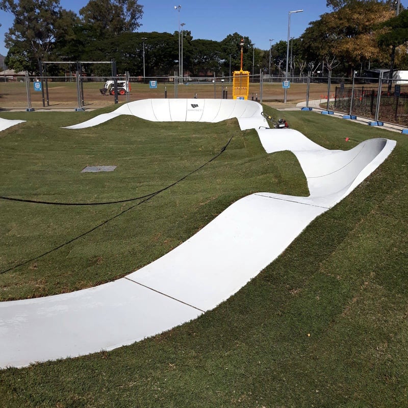 A modular pumptrack moulded into the surrounding terrain in Townsville, Australia.