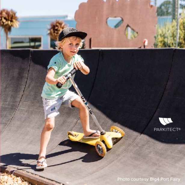 All ages, all abilities. Boy rides a PARKITECT modular pumptrack at Big4 Port Fairy in Victoria, Australia.