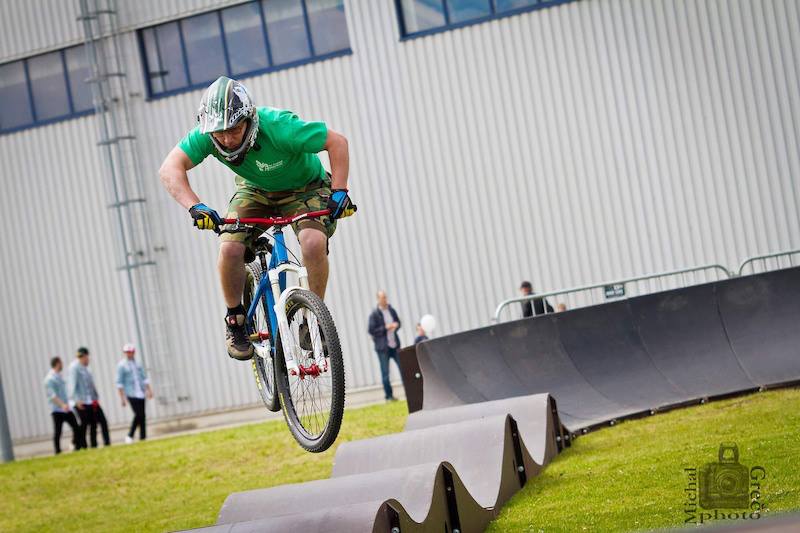 All ages, all abilities. Pro-rider male rides a PARKITECT modular pumptrack.