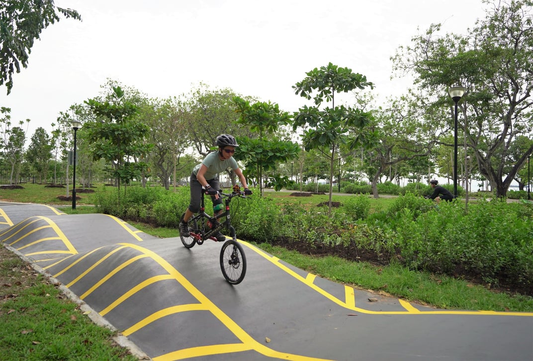 A cyclist rides the pumptrack in Cyclist Park at East Coast Park in Singapore. Photo courtesy Singapore National Parks Board.