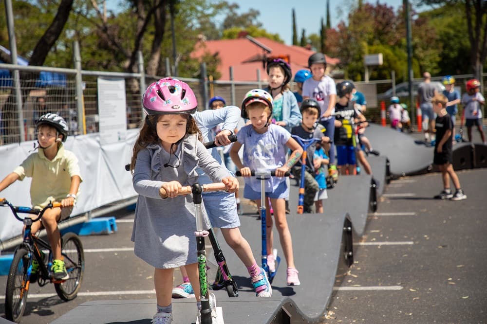 Kids flock to PARKITECTs modular pumptrack being tested in different location in Burnside, Australia.