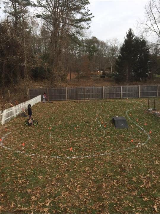 Michael Drakes backyard with future pumptrack marked and outlined on the ground prior to ground breaking. Photo courtesy of Michael Drake, BackYard Pumptracks Facebook Group.
