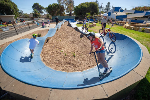 PARKITECTs modular pumptrack product photo with kids riding.