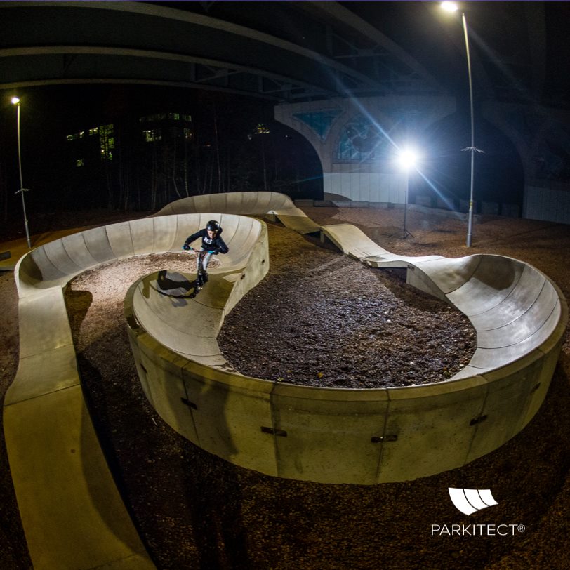 Rider on a modular pumptrack in a previously unuseable space.