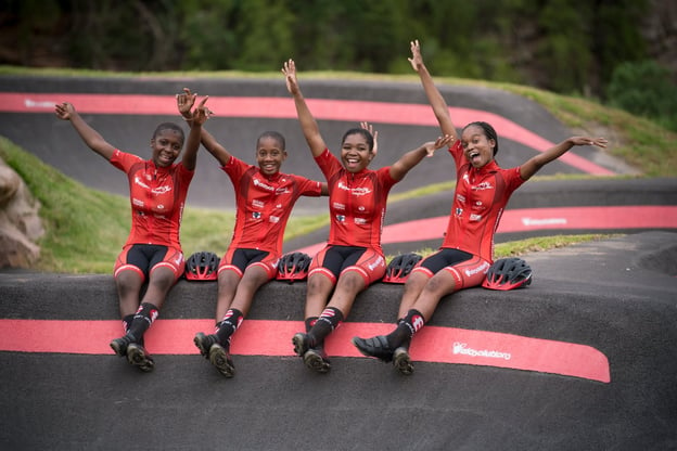 The all-female Velosolutions Izimbali team from Durban pose atop the pumptrack at the KwaDebeka bike park
