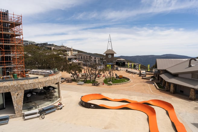 Orange pump track in the middle of a Mt Buller ski resort.